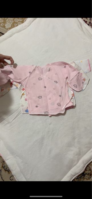 Одежды для новорожденных