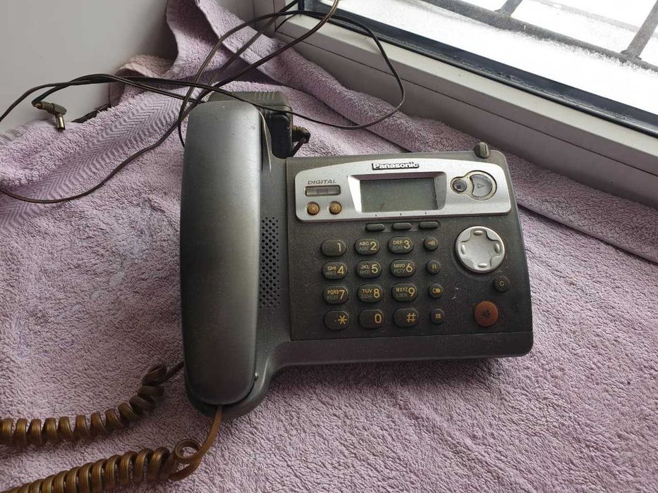 Магнитола Sony и телефон Panasonic