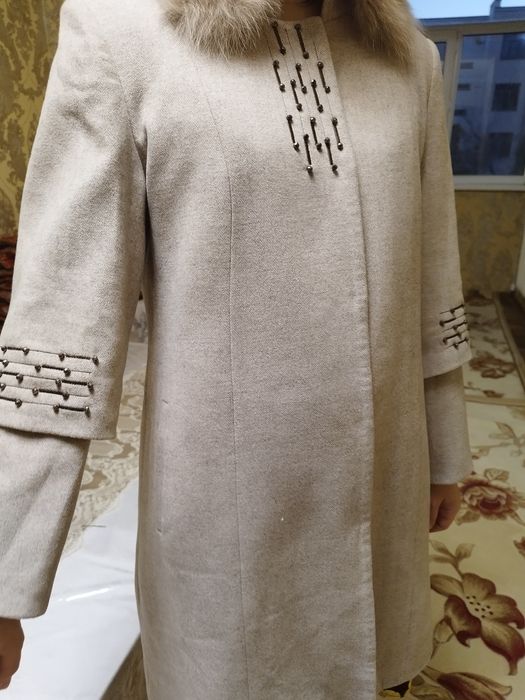 Yangi kiyilmagan palto