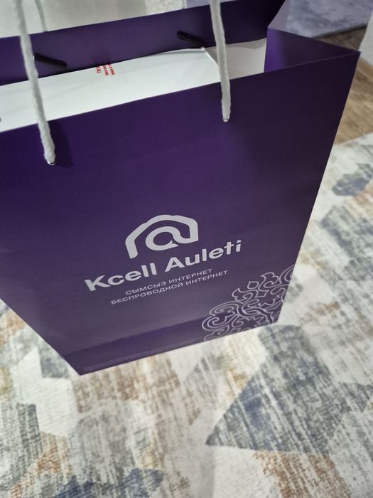 Продам сим карту и роутер Кселл