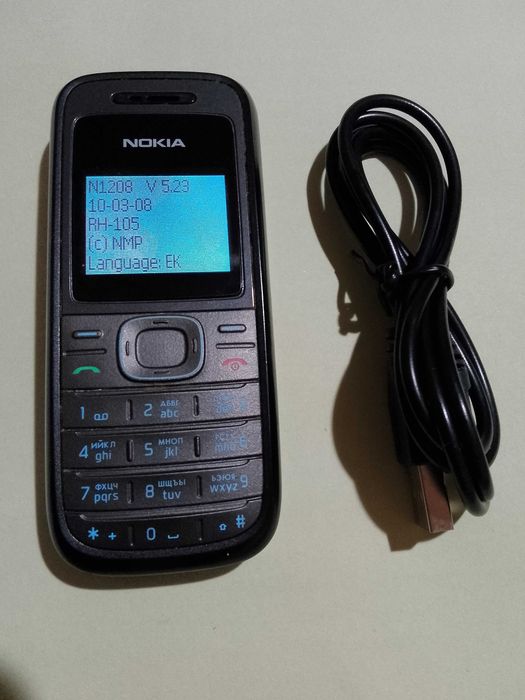 Работещ Nokia 1208 (bg меню) + кабел за зареждане
