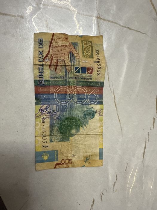 Продам 200 тг бумажными и продам 2000к донгов