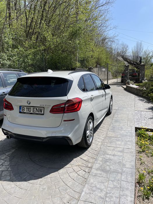 BMW 225xe active tourere, plug-in hibrid, an 2021, 83000km, tractiune integrala, M pachet, cumparata BMW Romania