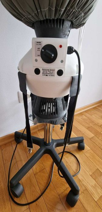 Aparat de uscat si calcat haine automat