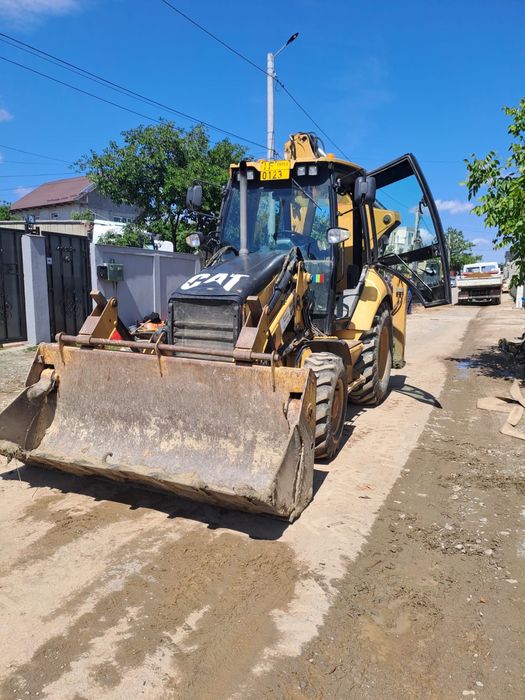 Buldoexcavator JCB Caterpillar