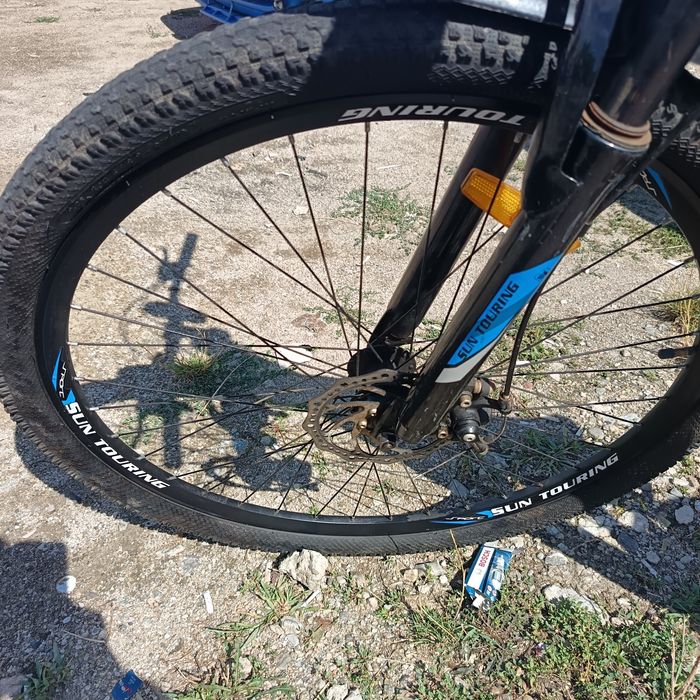 Bicicleta aproape noua