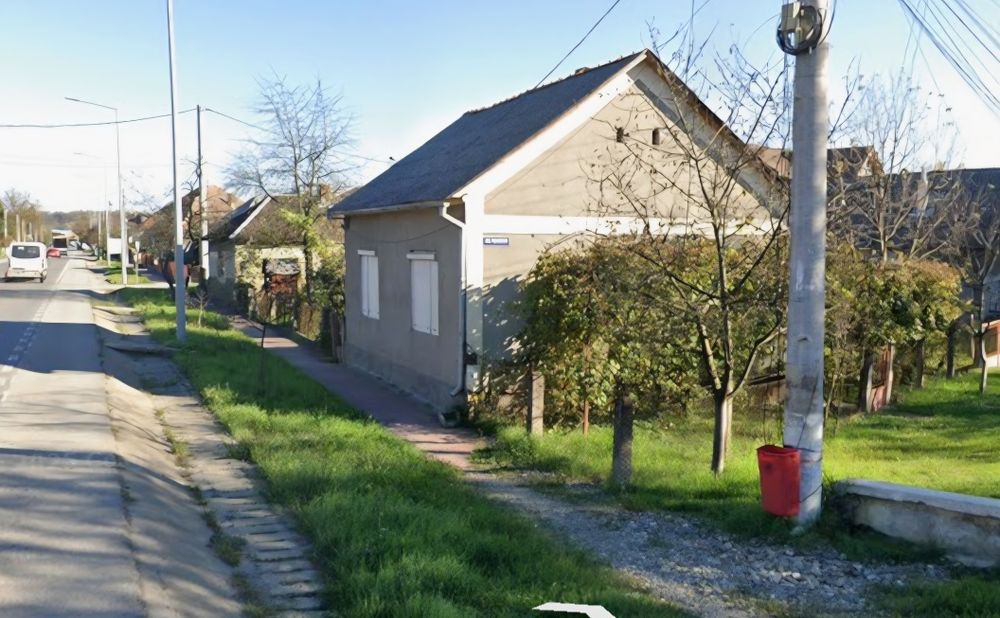 Proprietate   cu 2 case separate si anexa + 10 ari teren, Beclean