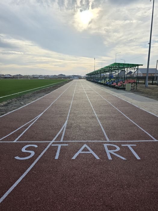 Резиновые покрытие, тартан