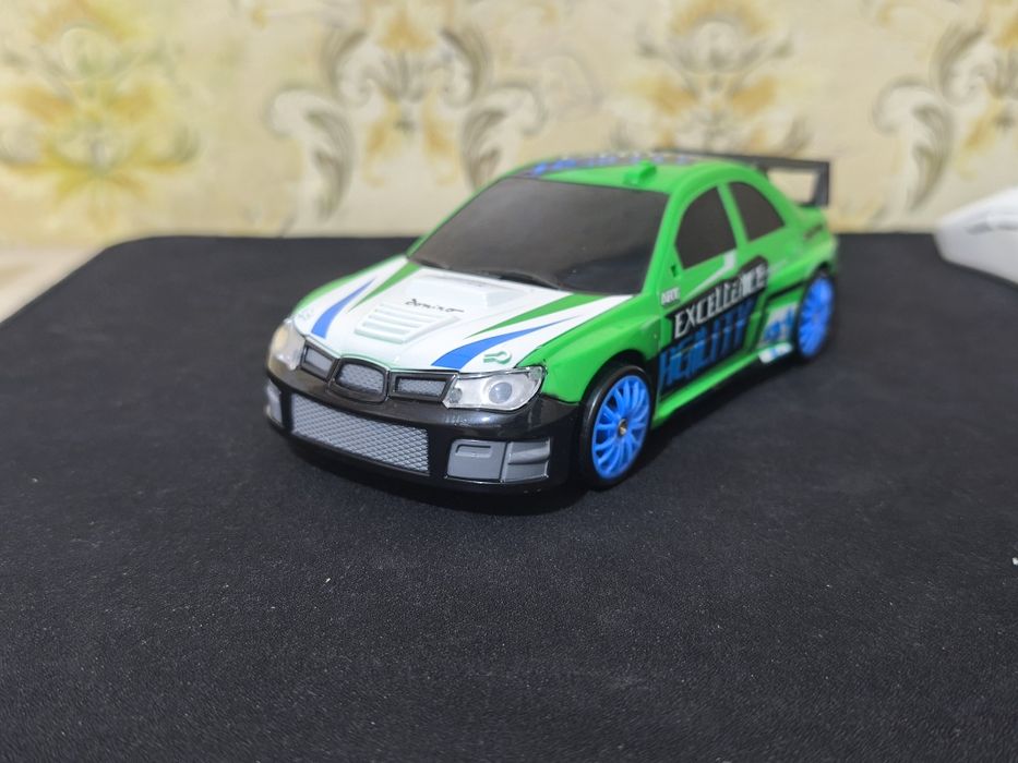 Машинка на пульте управления дрифт в комплекте зарядка в подарок 1акб.