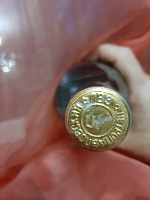 Продам бутылку с оригинальным содержимым 0,5 времён СССР .