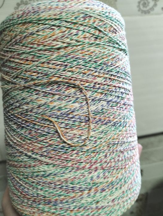 Пряжа в бобине .