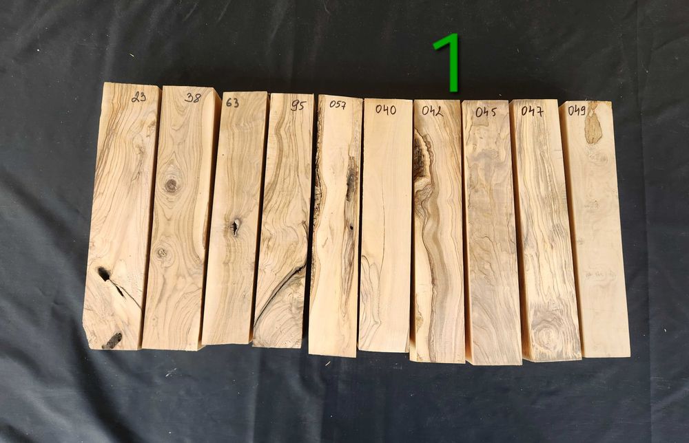 Заготовки (трупчета) от маслиново дърво (дървен материал)