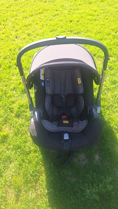 Scaun auto și cărucior Doona