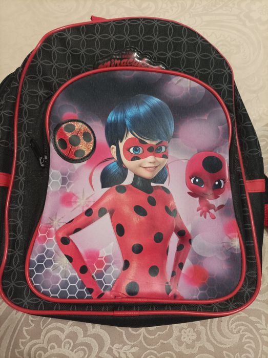 Продавам пъзел,раница,чанта за момиче с Калинката и Черния Котарак