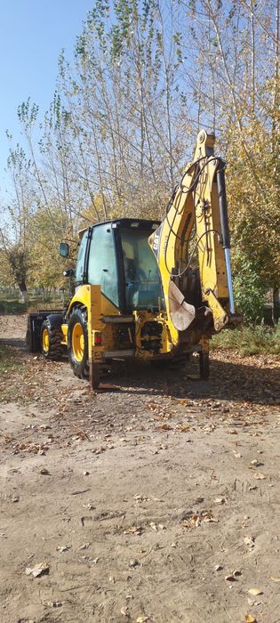 Продам экскаватор погрузчик 3в1 петушок
