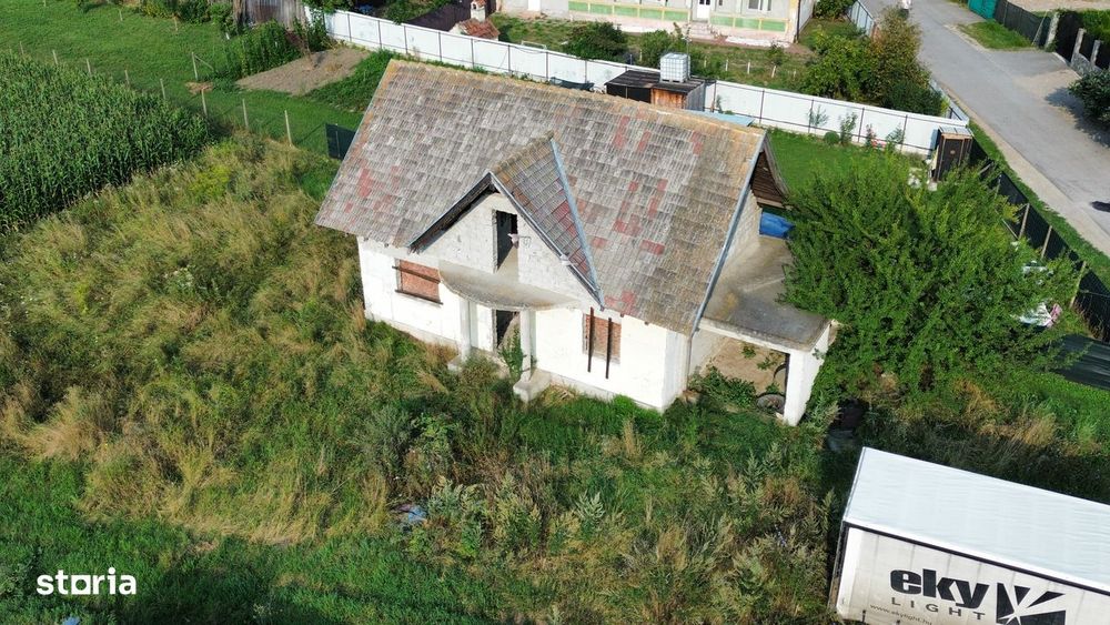 Casa la rosu Lunca Calnicului ,Prejmer,Brasov, teren 1000 mp.
