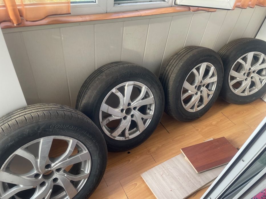 Продам летние шины с дисками на Шевроле Круз