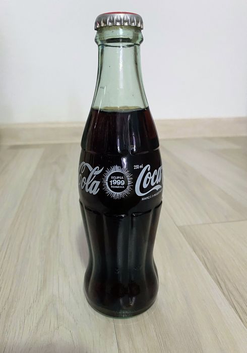 Sticlă Coca-Cola – Ediție comemorativă Eclipsa 1999 România – Obiect de colecție