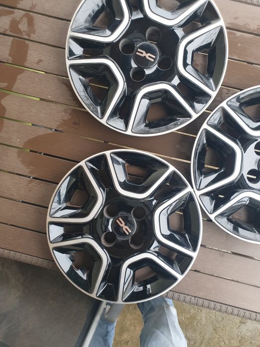 Capace DACIA SPRING 3(trei) bucati pe 15