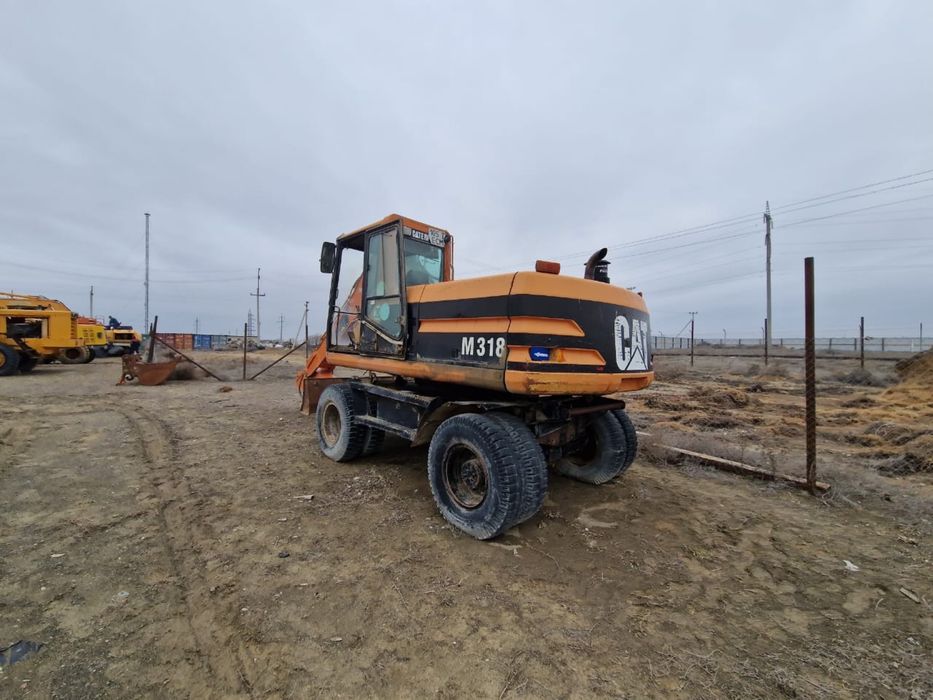 Колёсный экскаватор