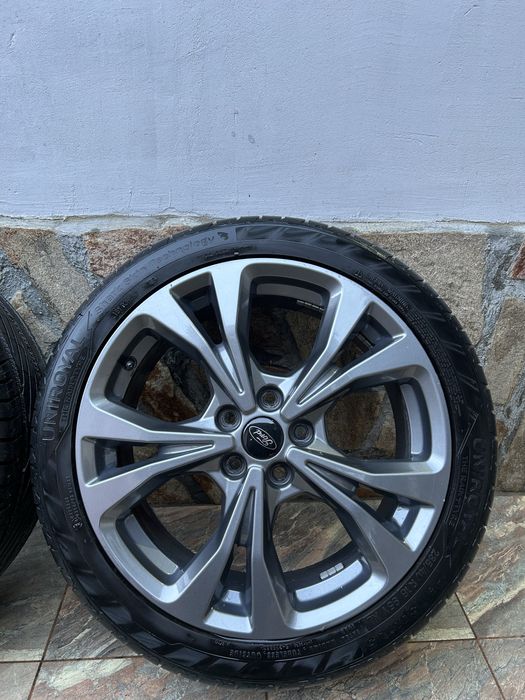 Джанти с гуми 18” 5х108 Titan