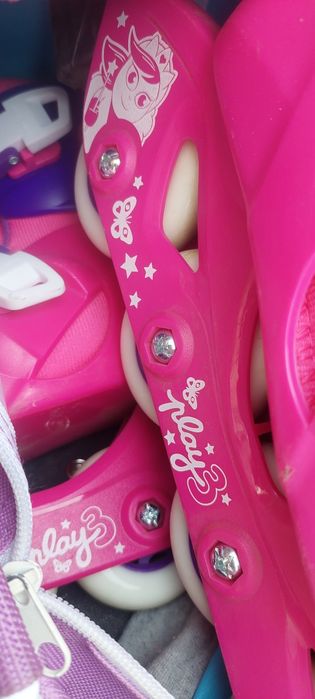 Роликовые коньки