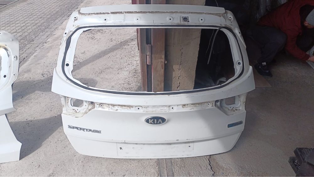 Крышка багажа кия спортедж