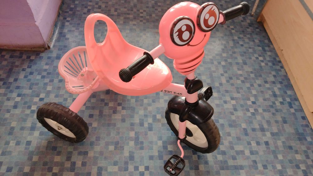 Tricicleta roz cu melodii