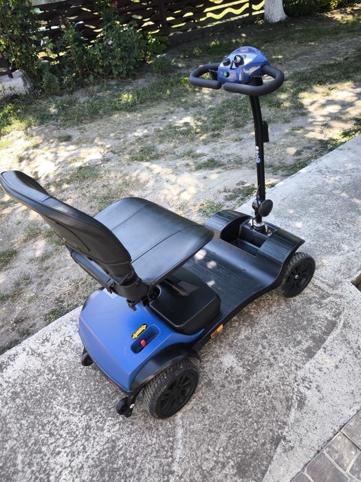 Cărucior electric pentru persoane cu dizabilități