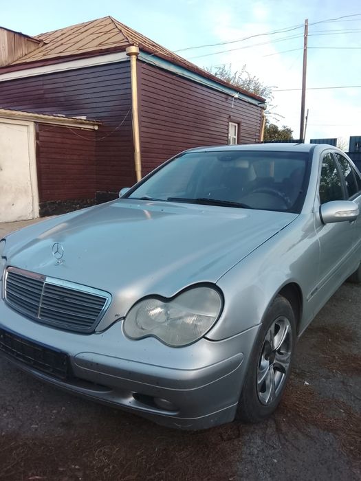 Мерседес Бенц W203