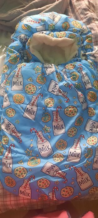 Продам комбинезон на выписку.