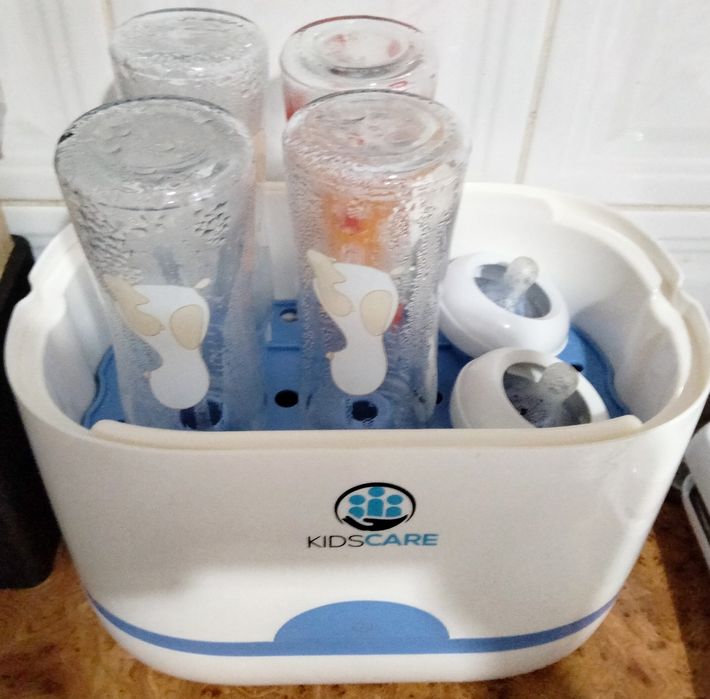 Sterilizator electric + încălzitor electric + 4 biberoane din sticlă