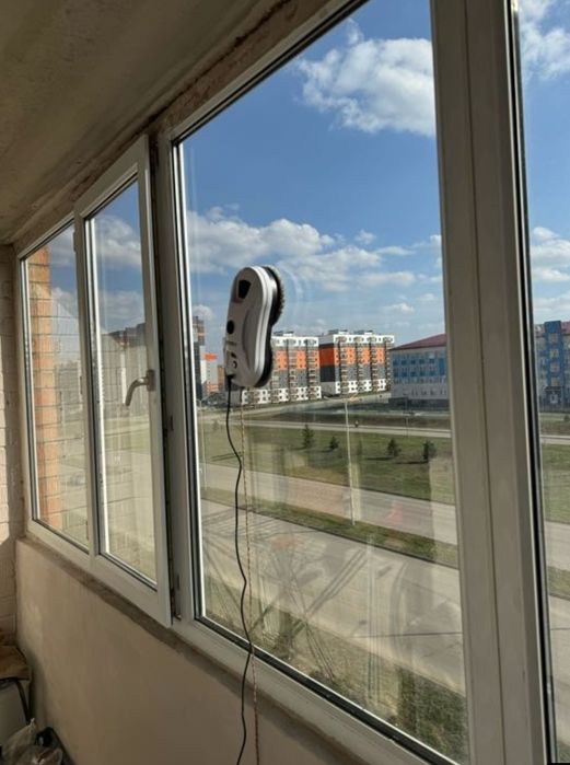 Мойка окон роботом стеклоочистителем