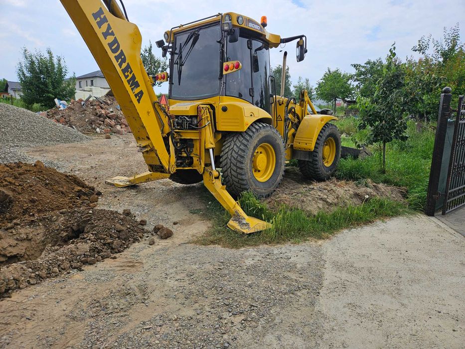 Servicii cu Buldoexcavator