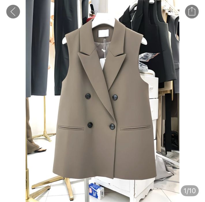 Продам жилетку новая