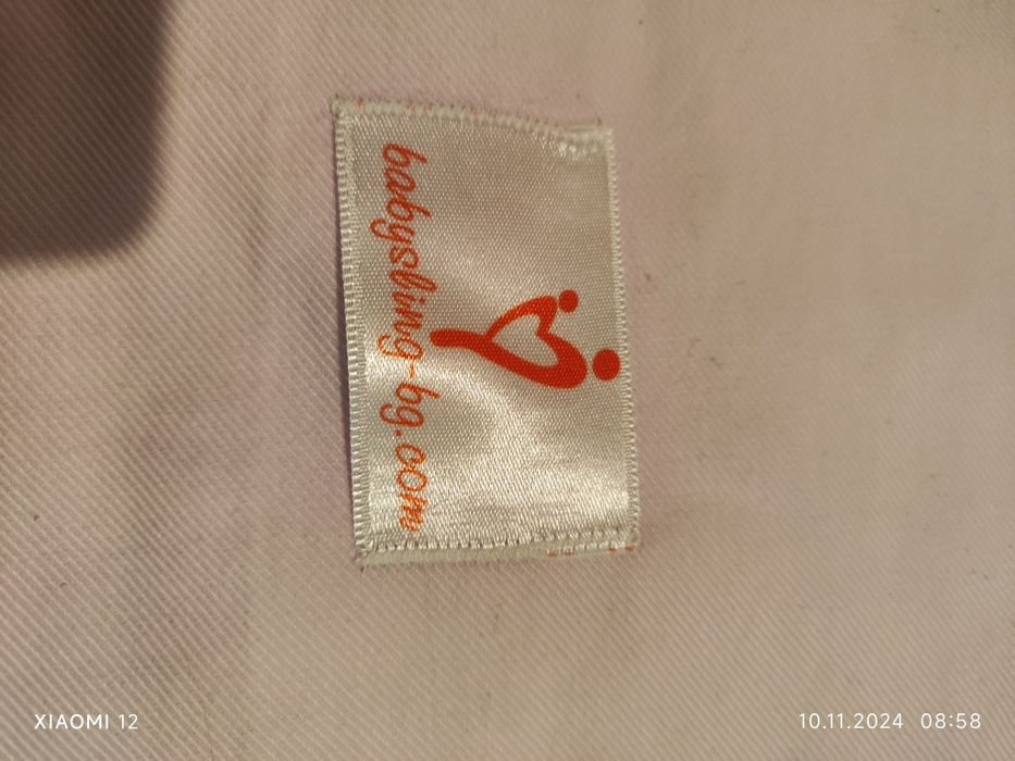 Слингшал за носене на бебе