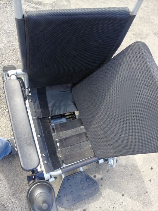 Нвалидная коляска с электроприводом.