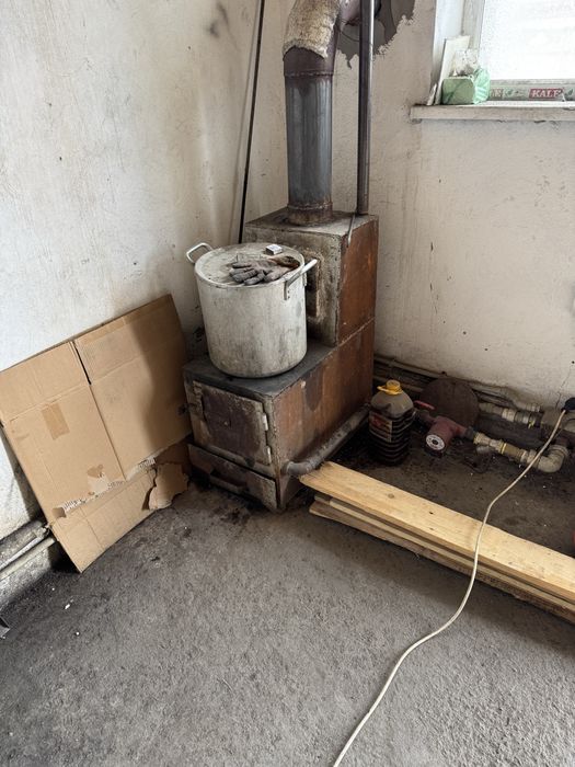 Продам печку газ уголь на 300 кв