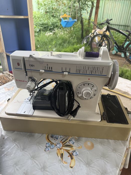 Продам швейную машинку зингер.