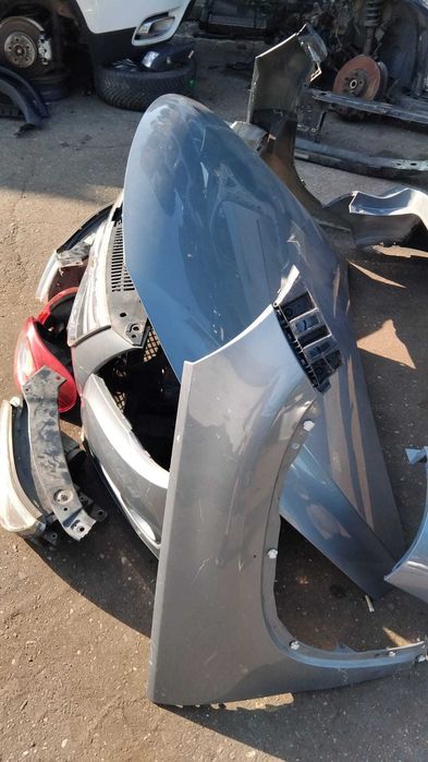 Aripa stanga/dreapta Volkswagen Tiguan an 2009