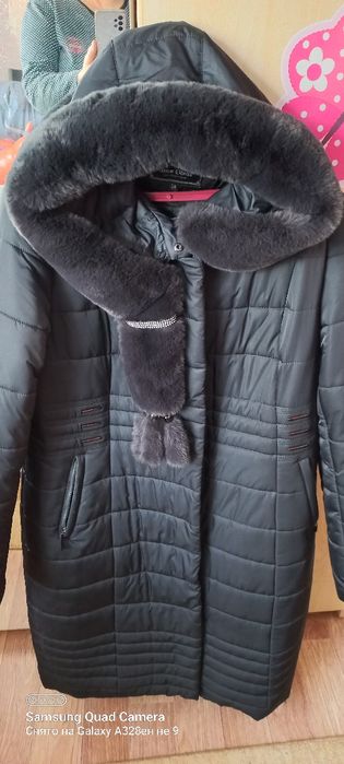 Продам пуховик женский