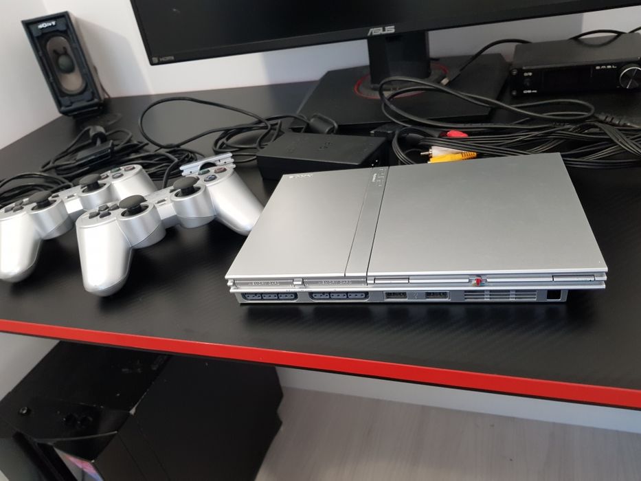 PlayStation 2 Slim Silver - 2 manete originale + Cameră EyeToy set complet
