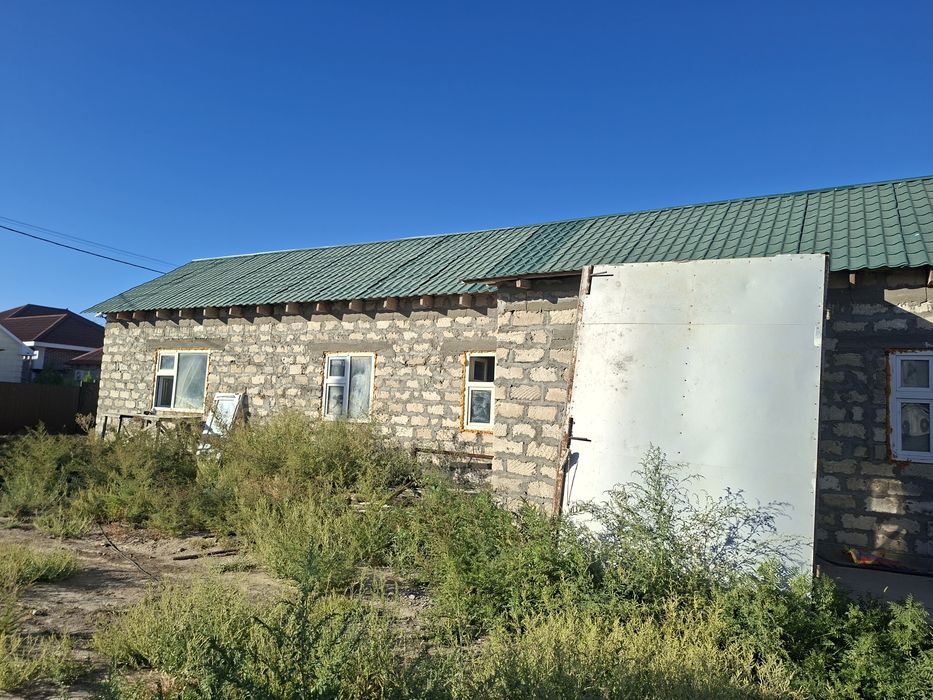 Курилкино, недостроенным домом