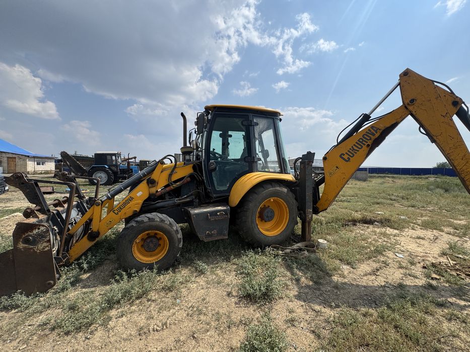 Продам экскаватор погиузчик Cukurova883