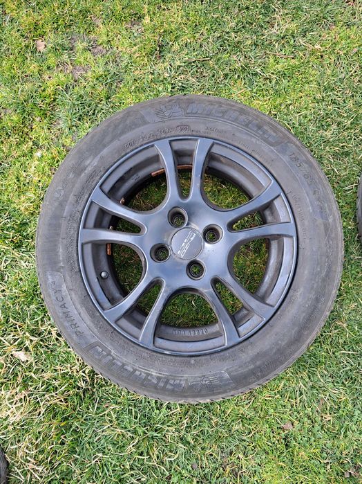 Set jante R15 4x108 Anzio negre + cauciucuri (Peugeot 207)