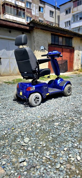 Scuter Carut electric INVANCARE pentru persoane cu dizabilități sau mobilitate redusa