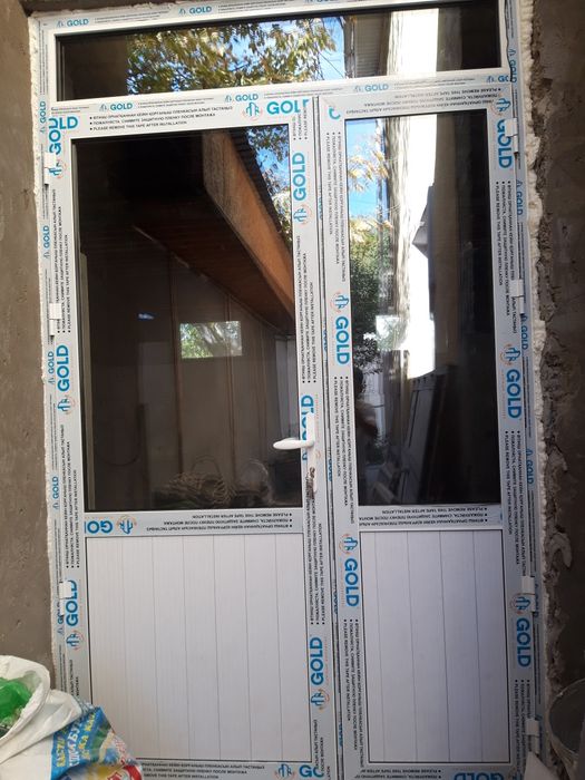 Пластиковые и алюминиевые окна двери.