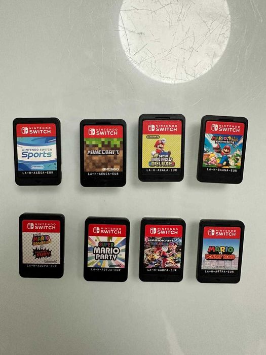 NINTENDO Switch + 8 jocuri