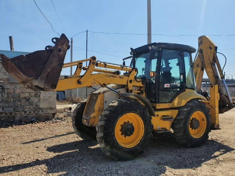 Услуги экскаватора погрузчика