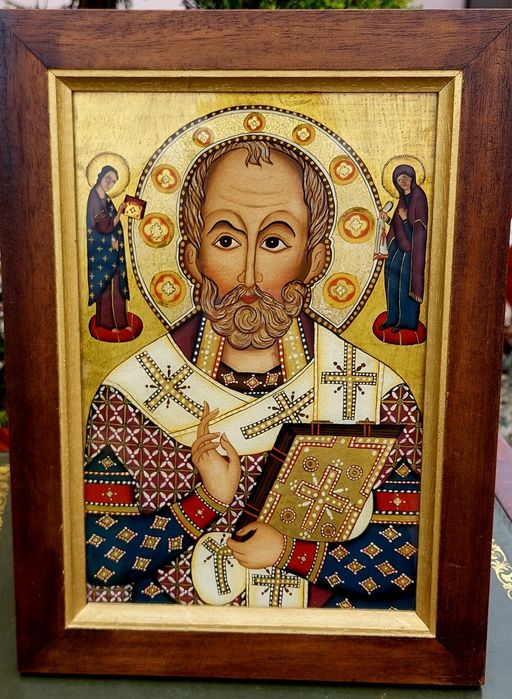 Icoană religioasă pictată pe sticlă.